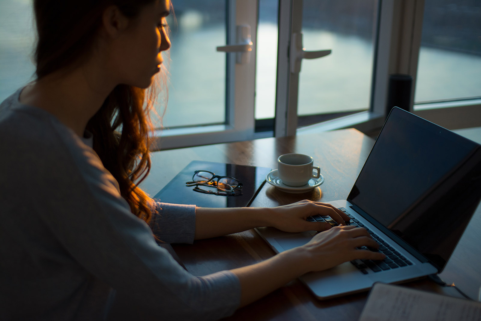 Woman writing a letter to the editor