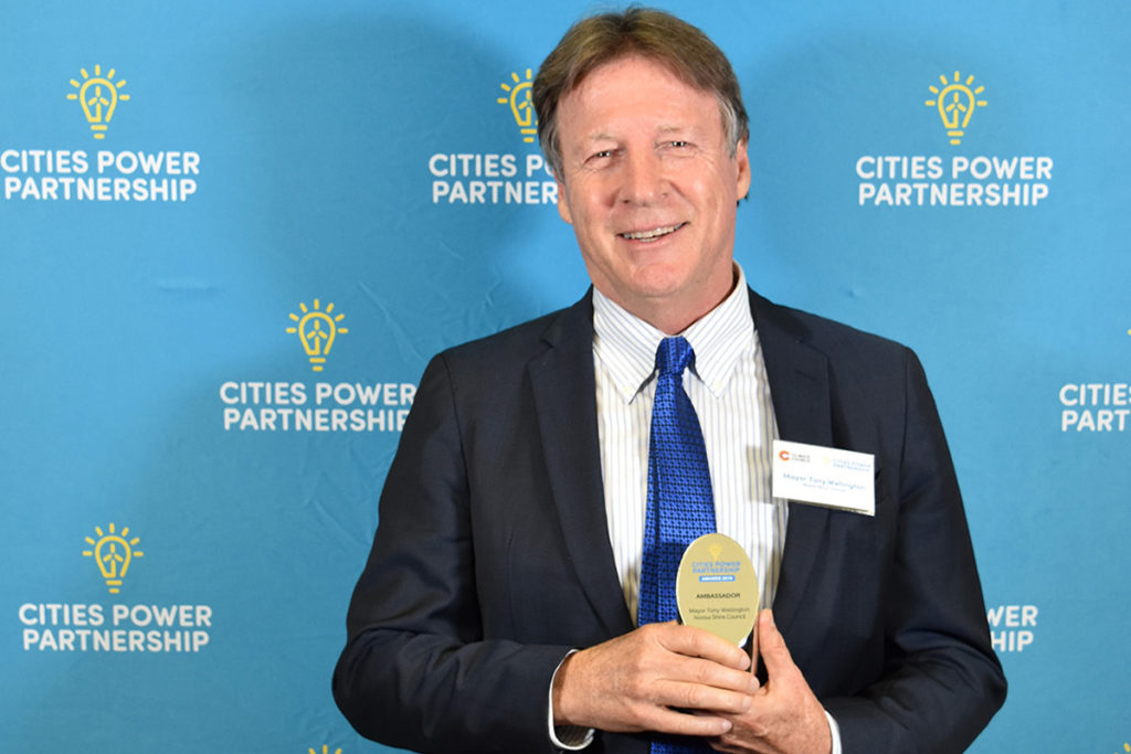 An image of the Mayor of Noosa Shire Council, Tony Wellington, holding his CPP award.