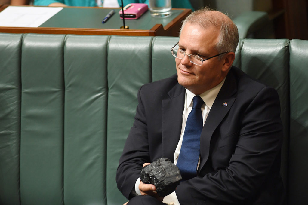 An image of Prime Minister Scott Morrison holding a lump of coal in parliament.