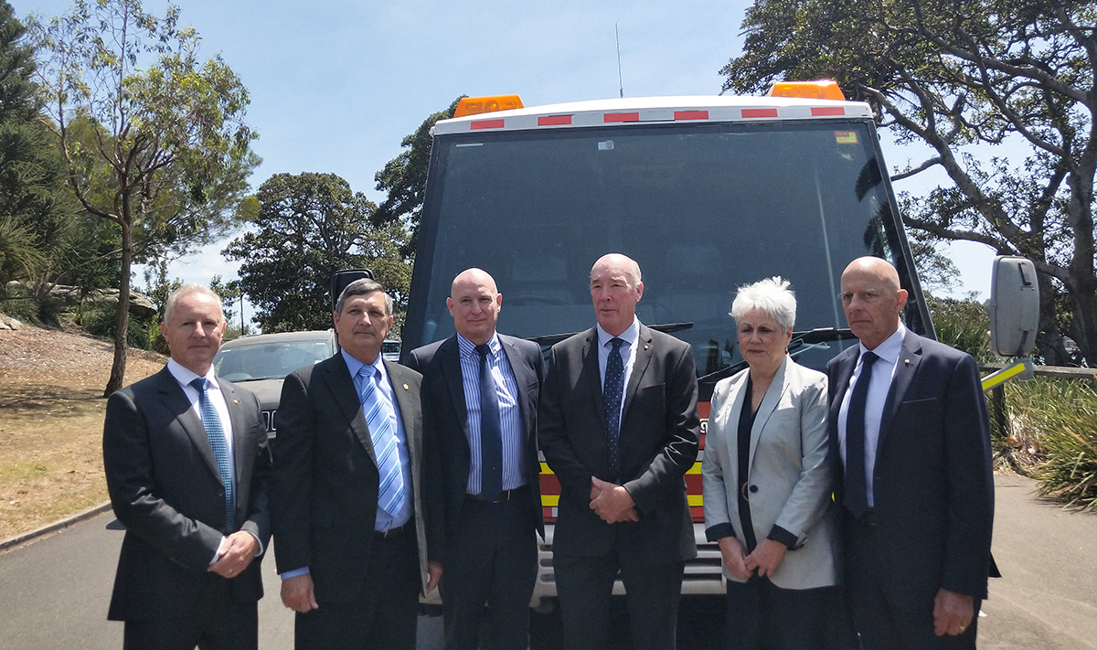 An image of some of the Emergency Leaders for Climate Action members standing in front of a fire truck.