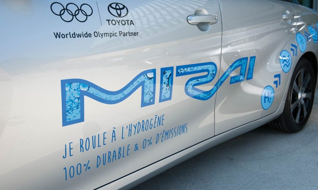 The side of a Toyota Mirai, a renewable hydrogen vehicle used at the IOC