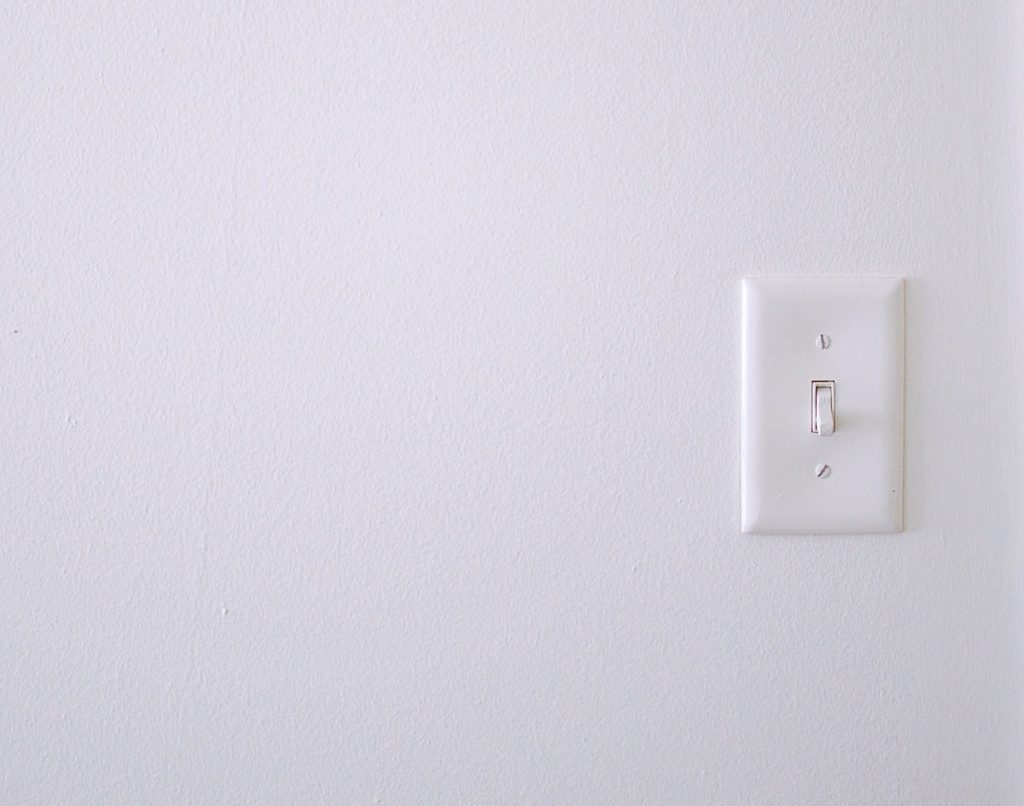 light switch on white wall