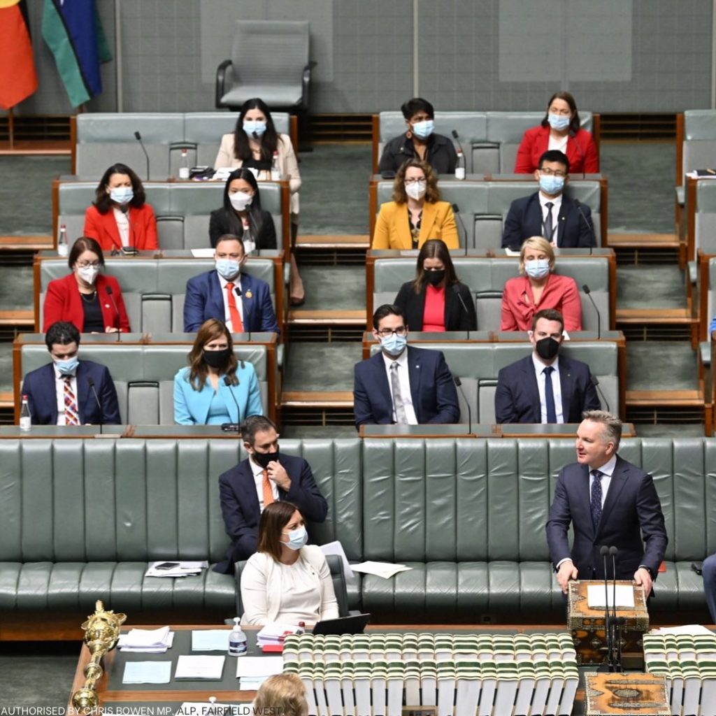 Chris Bowen stands in parliament